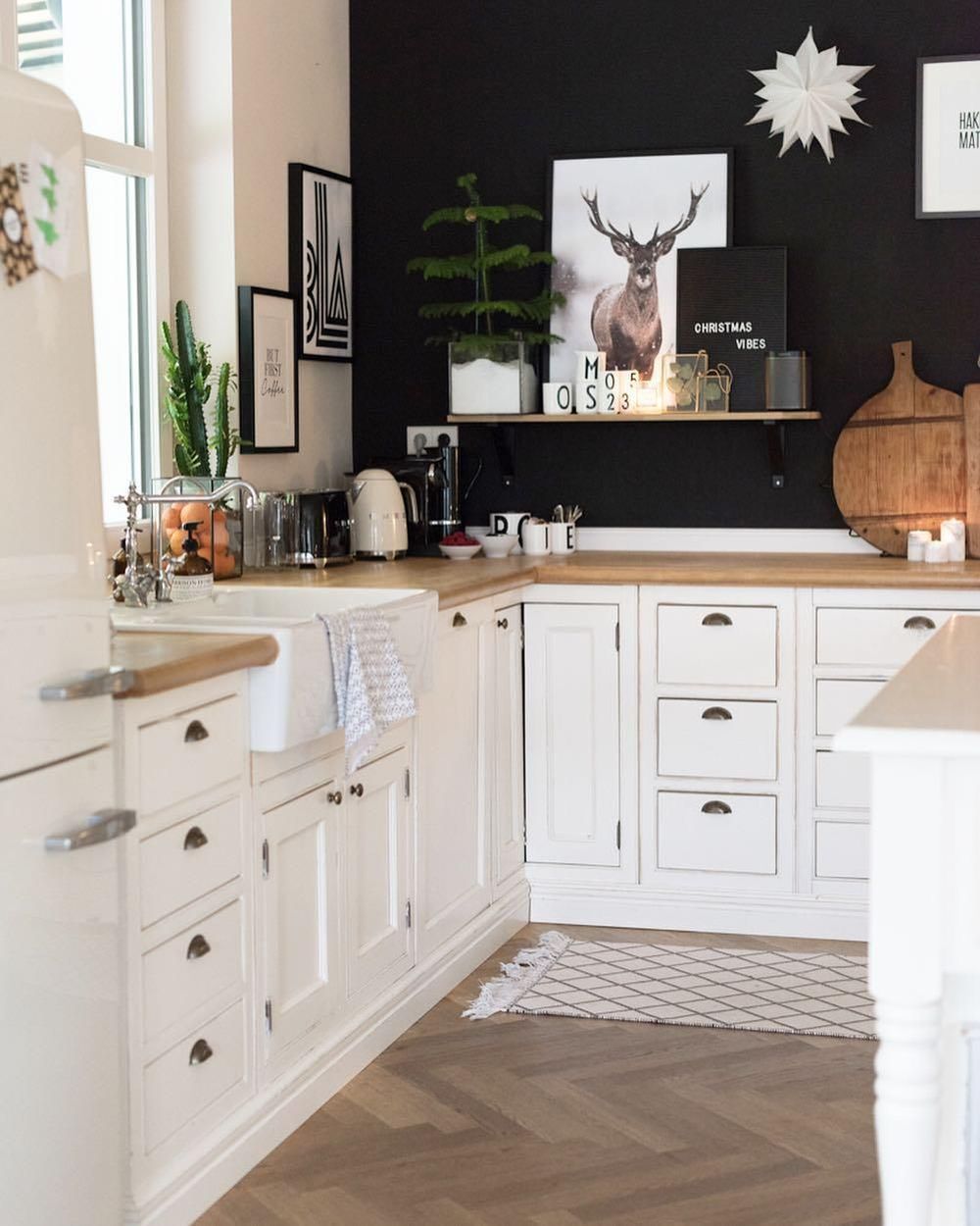 Reindeer Art in Scandi Black Kitchen