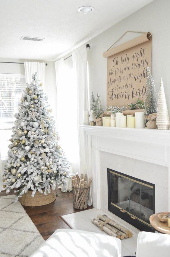 White Flocked Christmas Tree Decor via Julie Warnock Interiors