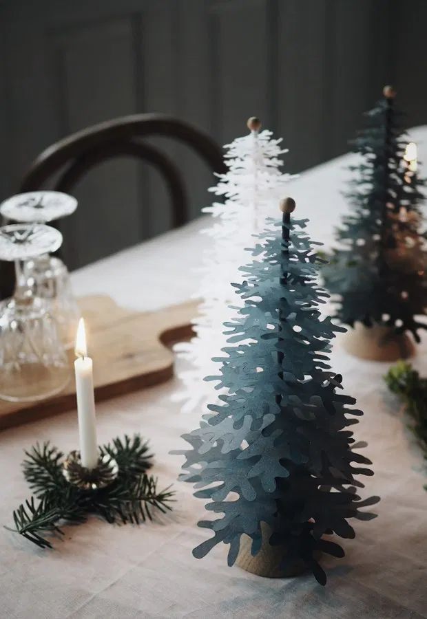 DIY Scandi Paper Trees via thesefourwallsblog - DIY Scandinavian Christmas Decorations