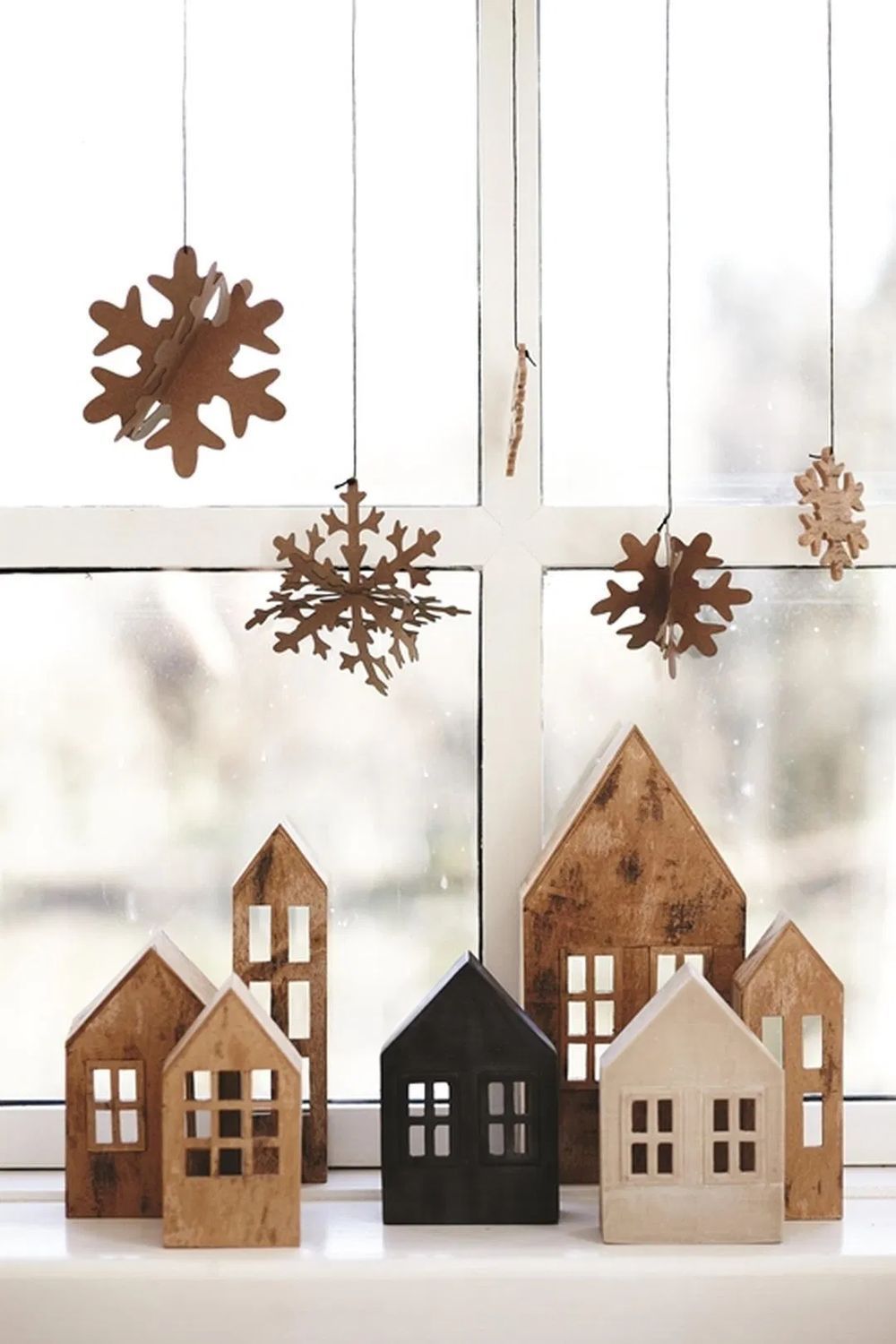 DIY Scandinavian Christmas Decorations Cardboard houses and snowflakes