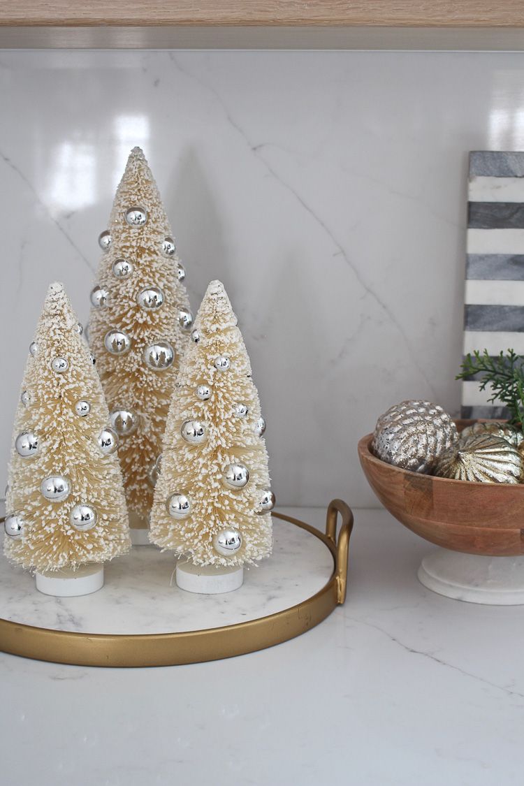 Glam Mini Christmas Trees on a Serving Platter in the Kitchen via thehouseofsilverlining
