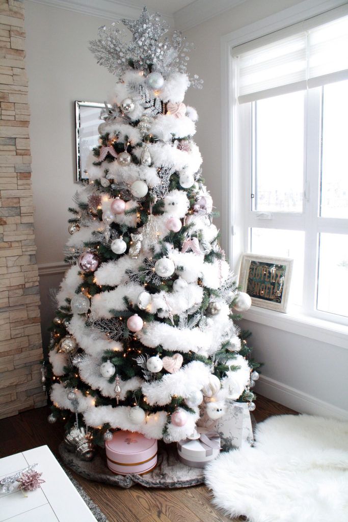 Pink and silver glam Christmas tree with furry garland decor via chandeliersandchampagne