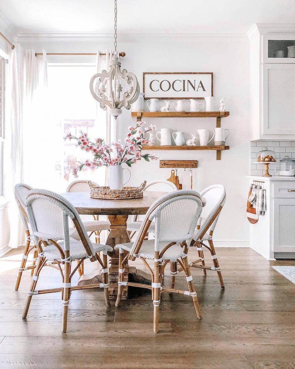 French bistro chairs around wood table Breakfast Nook via @thedowntownaly