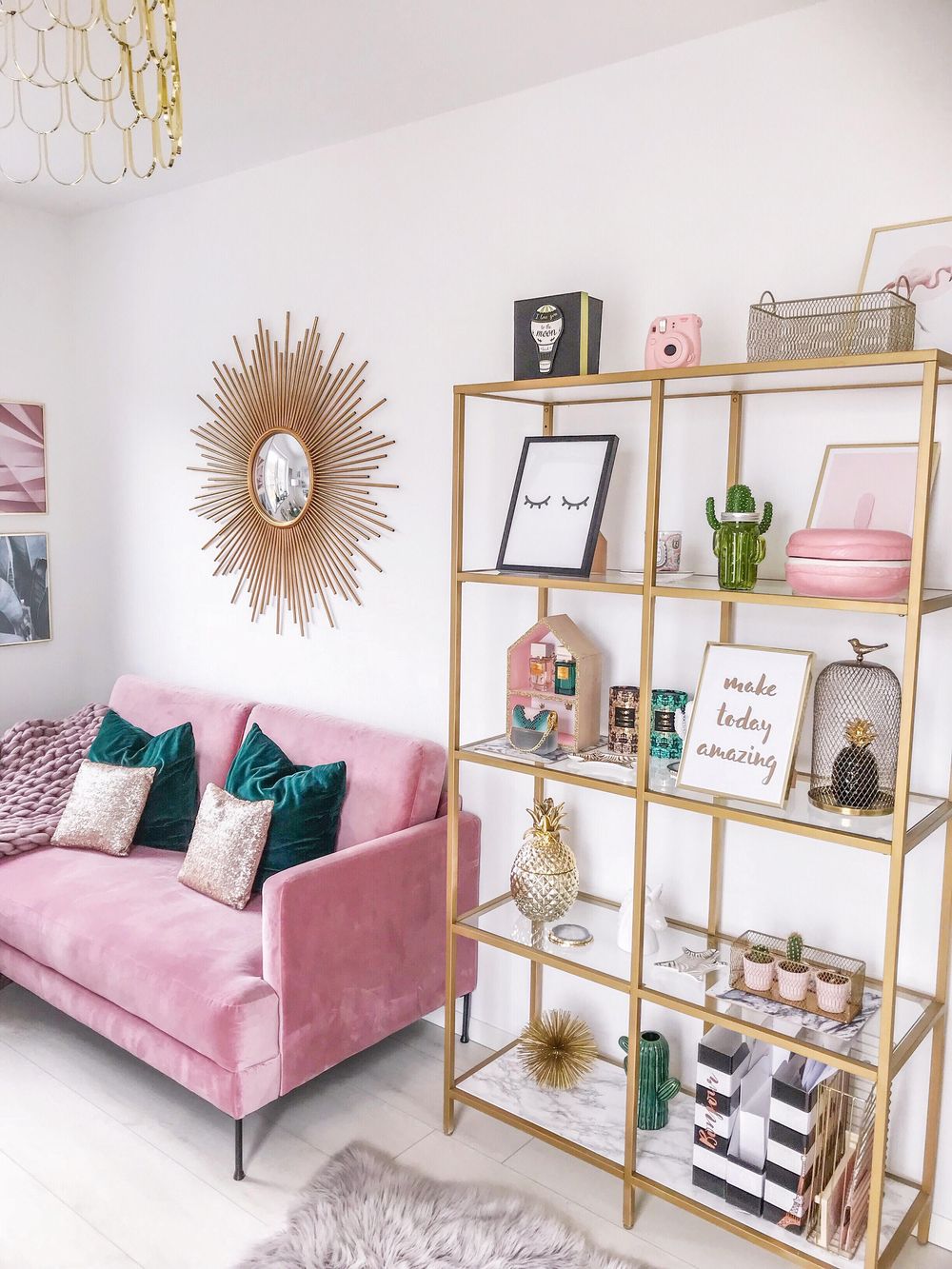 Glam pink sofa and gold bookcase via fashionhippieloves