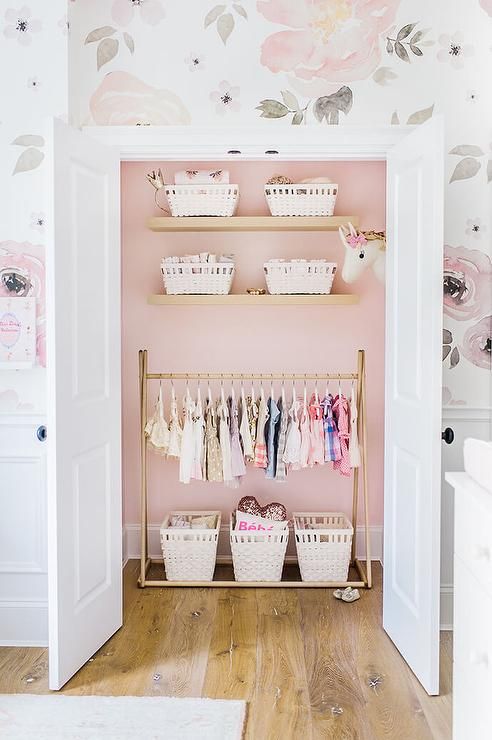 Pink walls inside closet via Monika Hibbs