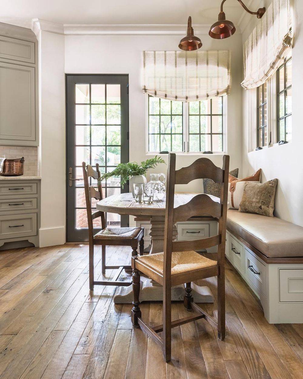 Rustic Country Breakfast Nook with Wood Table and Chairs via @marieflaniganinteriors