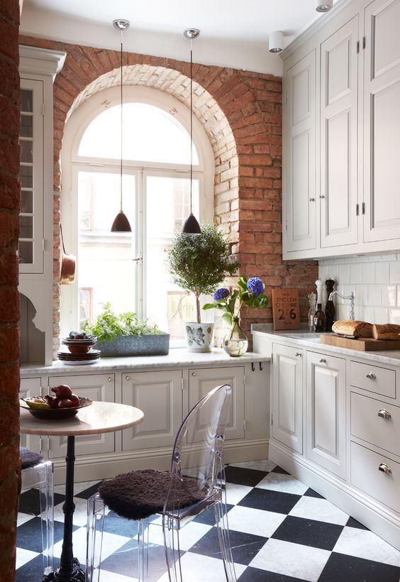 Black and white checkered floor in the kitchen and dining nook