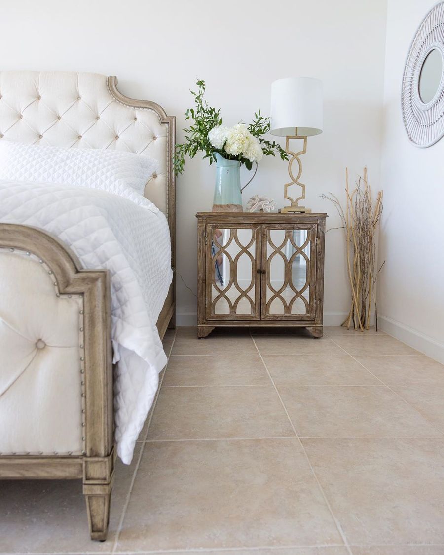 Cream tufted headboard and rustic pitcher in French Country Bedroom via @shabbyfufu