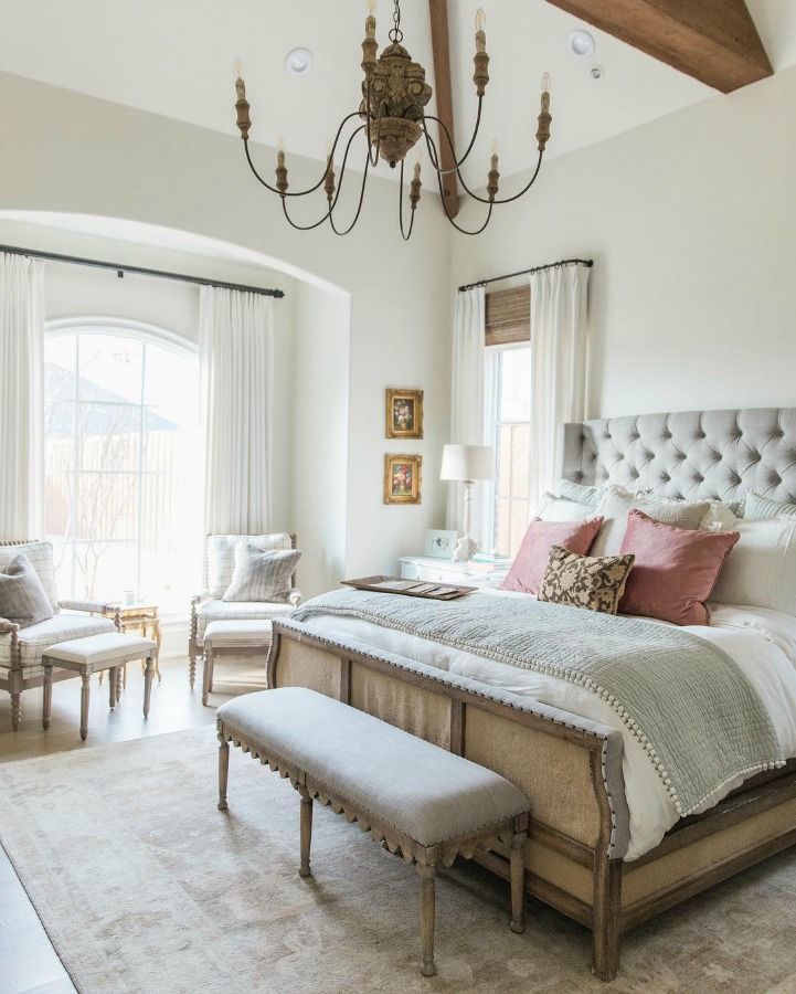 French country bedroom with Belgian bench and rustic accents via Brit Jones Design