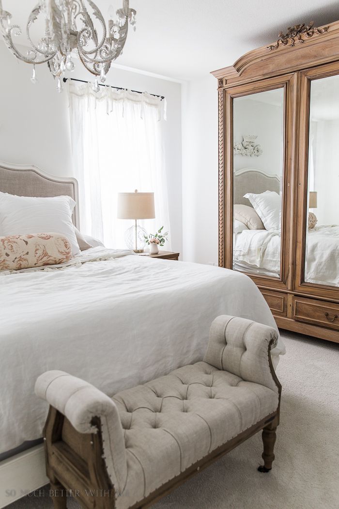 French country bedroom with Large Wood Armoire and Tufted Bench via So Much Better With Age