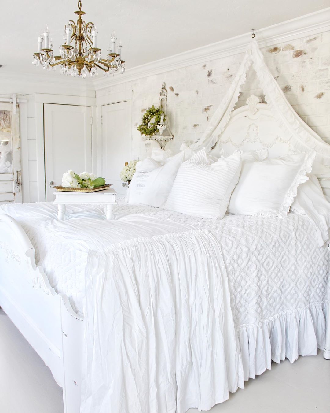French country bedroom with white bedspread via @simplyfrenchmarket
