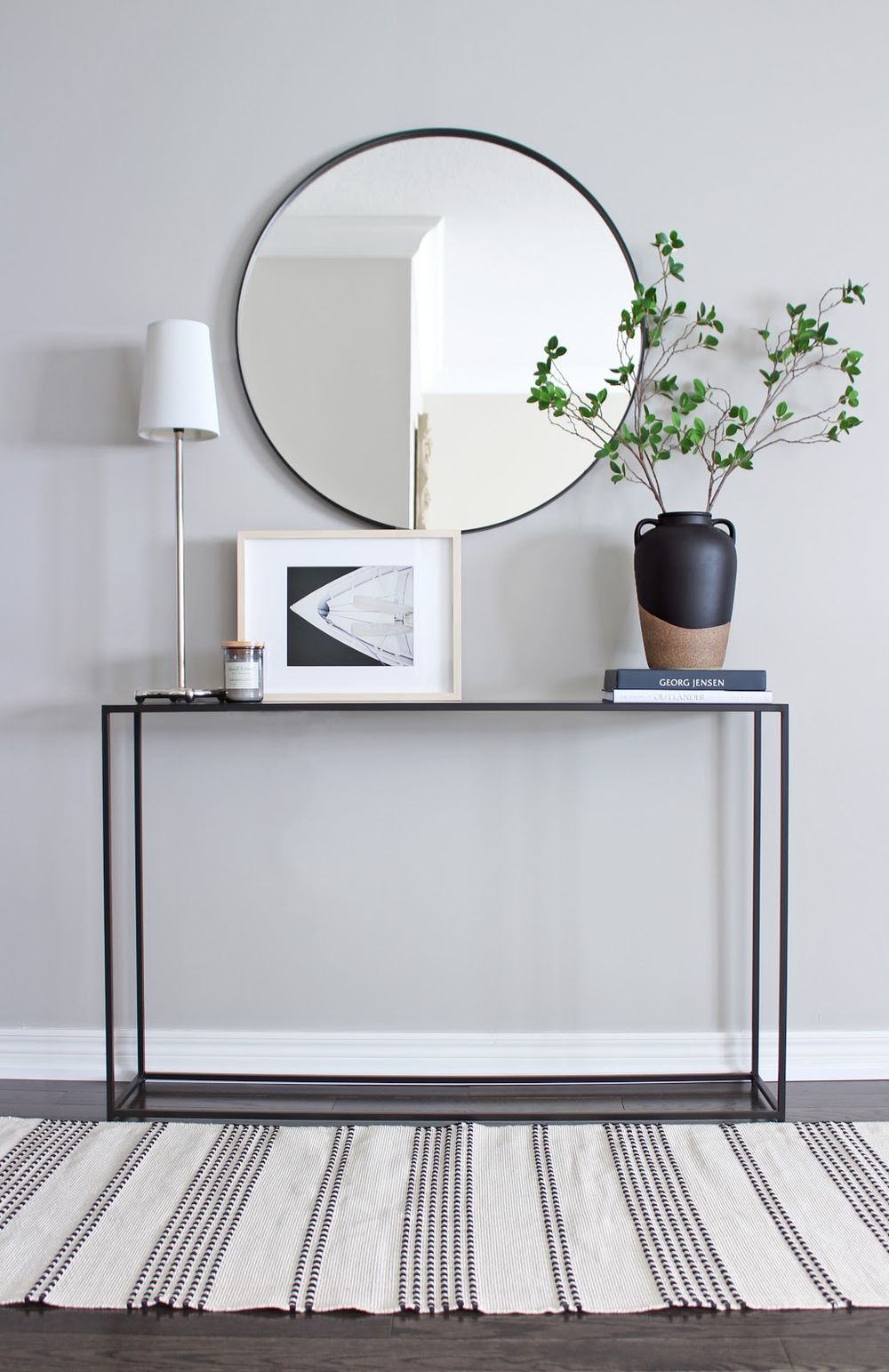 Scandinavian Console Table with round mirror and plants via amdolcevita