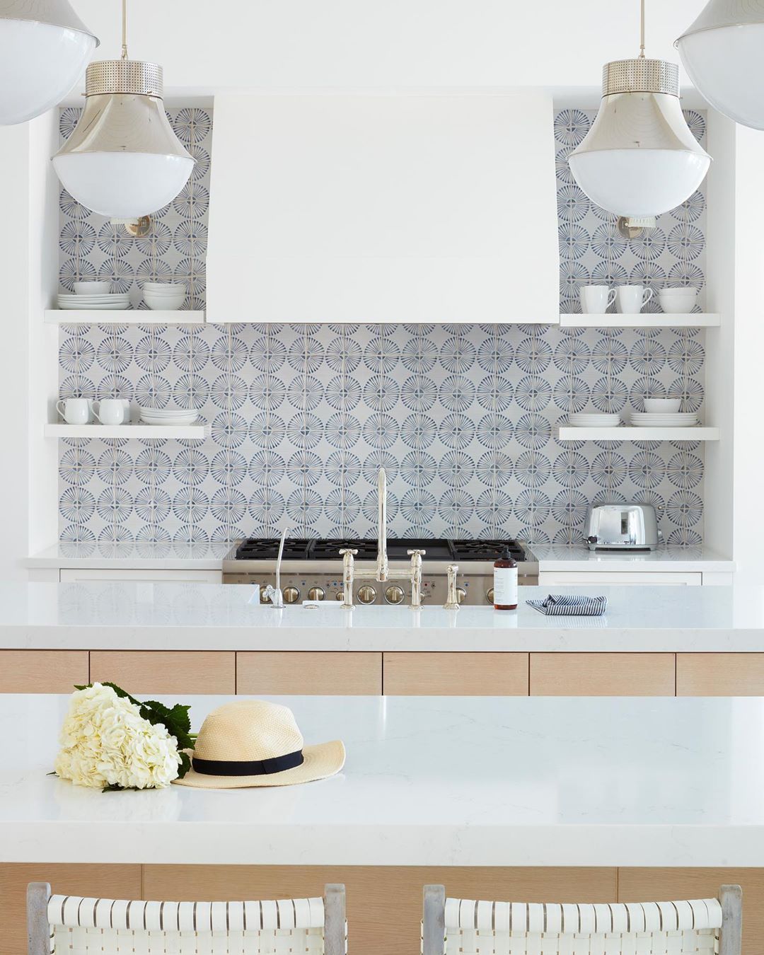 Coastal Kitchen with Blue Tile Backsplash via @karahebertinteriors