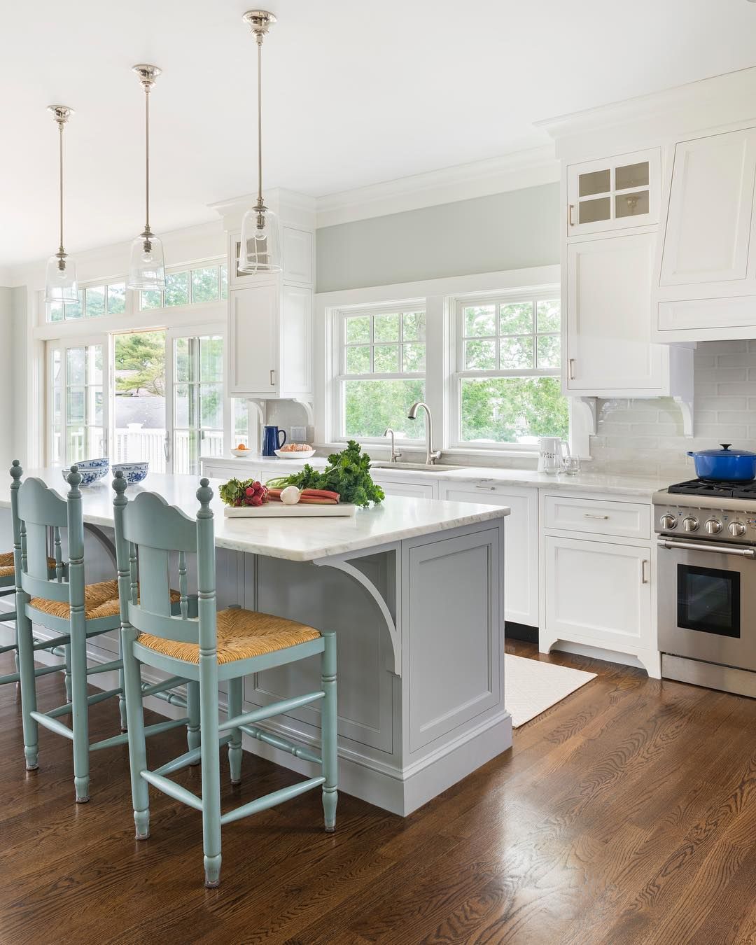 Coastal Kitchen with Pastel Blue Counter Chairs via @digsdesignco