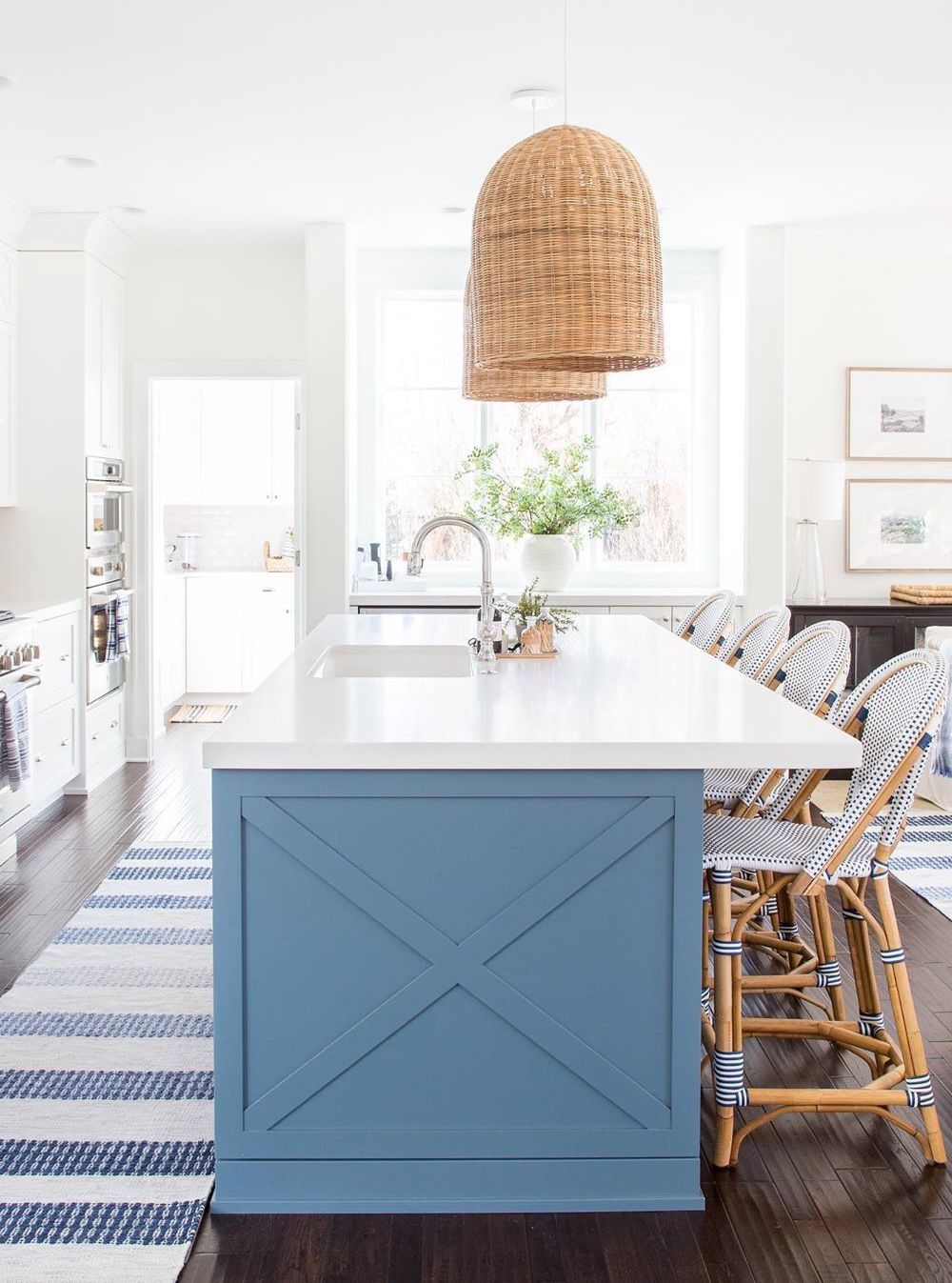 Coastal Kitchen with Sea Blue Kitchen Island, Stripe Rug and French Bistro counter chairs via @lifeonvirginiastreet