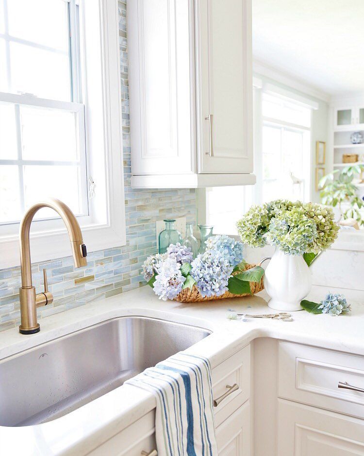 Coastal Kitchen with Seaglass blues, greens, and gold backsplash via @sandandsisal