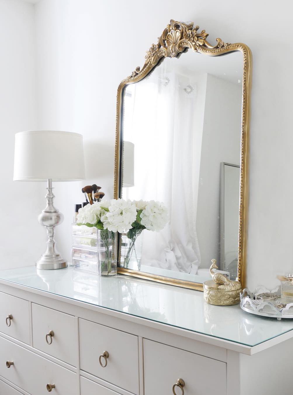 Glam Mirror with gold frame on white dresser via @citychicdecor