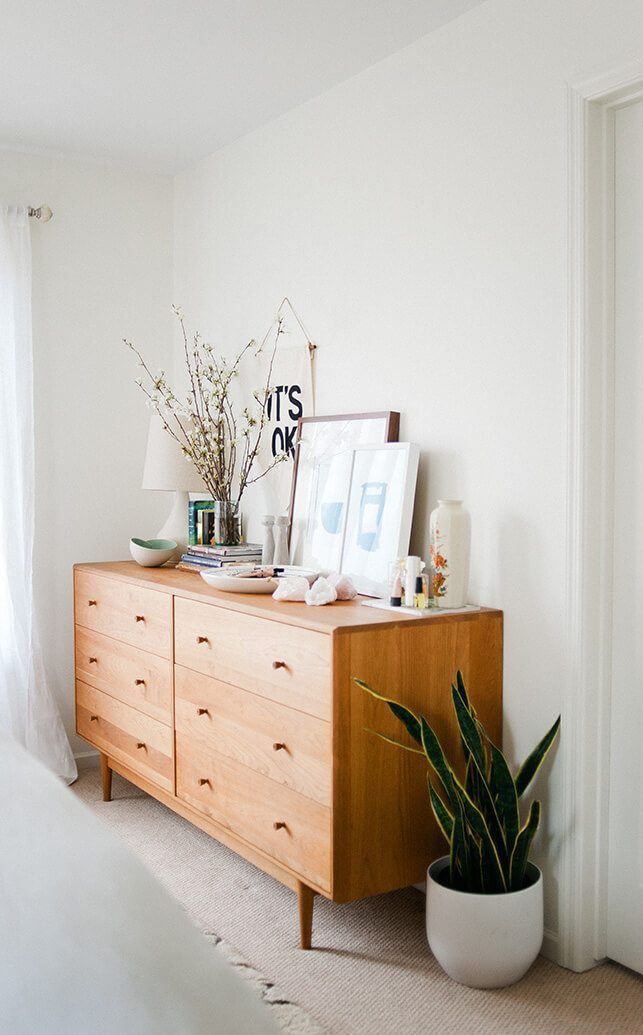 Brown wood Mid-century Modern Dresser via Shaynah Dodge Glitter Guide