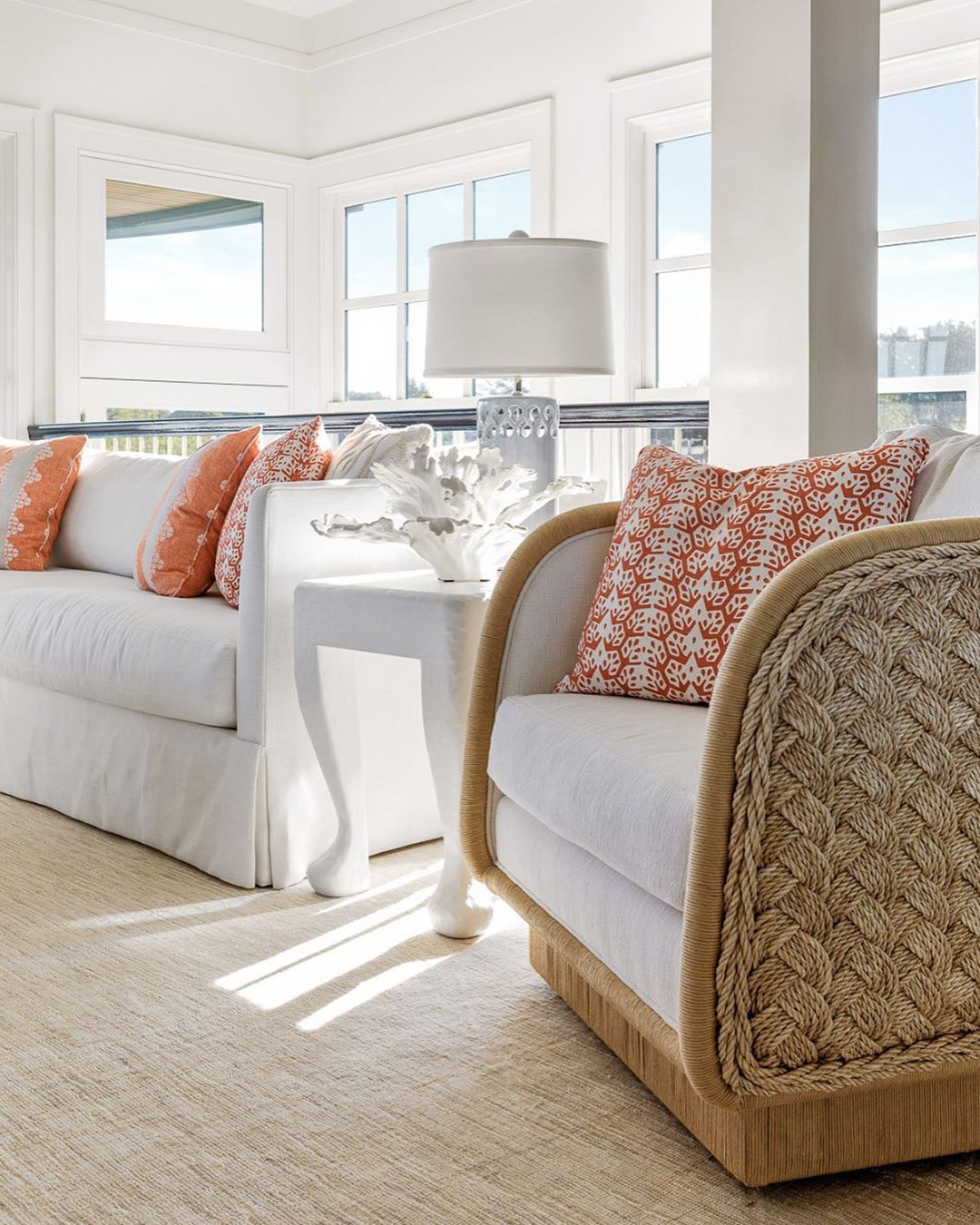 Coastal Living Room with Coral Throw Pillows via @digsdesignco