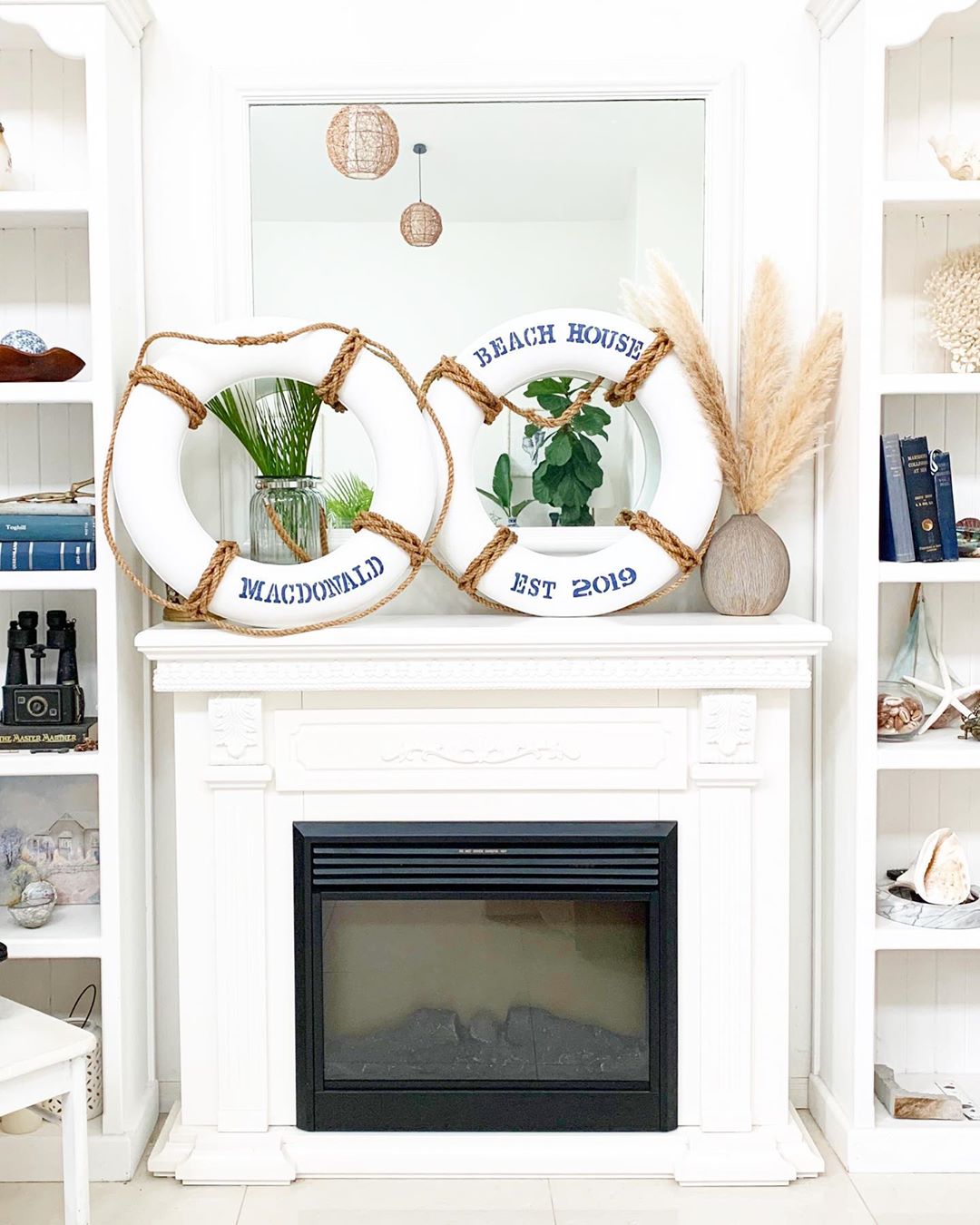 Coastal Living Room with Lifebuoys on the Mantel via @australian_nautical_style