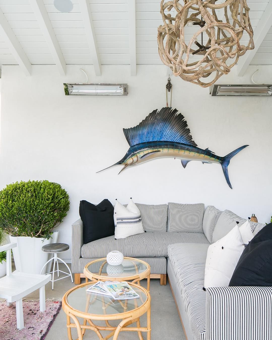 Coastal Living Room with Marlin Fish Wall Decor by @shopskout