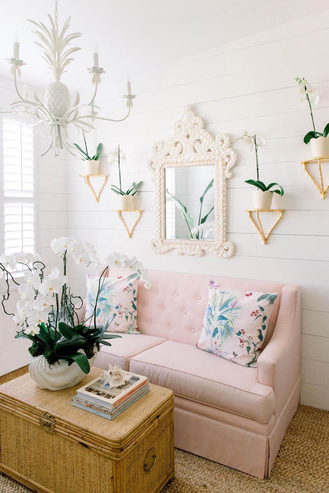 Coastal Living Room with Pineapple Chandelier via palmbeachlately