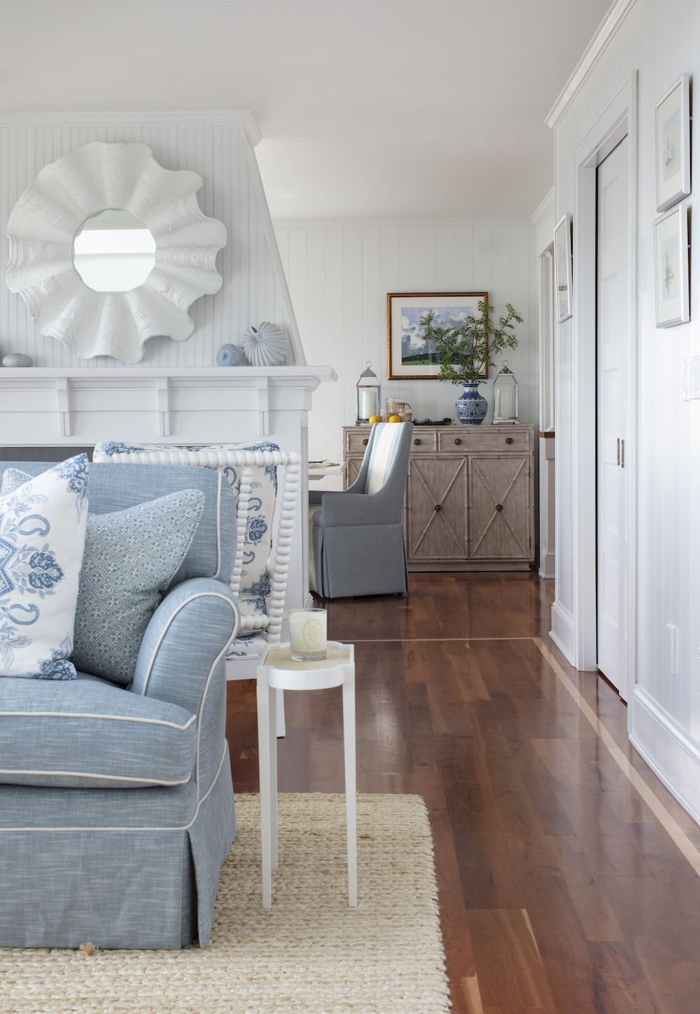 Coastal Living Room with Seashell Mirror via Elements of Style