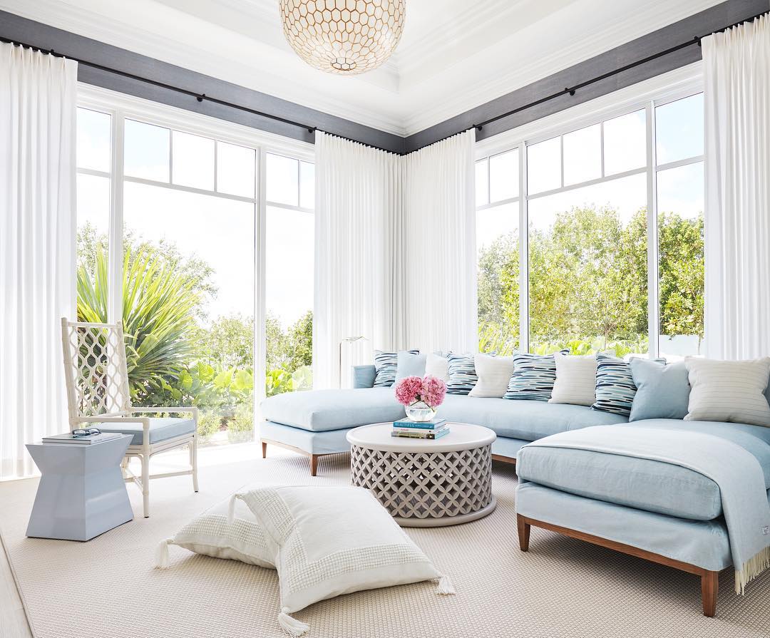 Coastal Living Room with Soft Blue Sofa via @karahebertinteriors