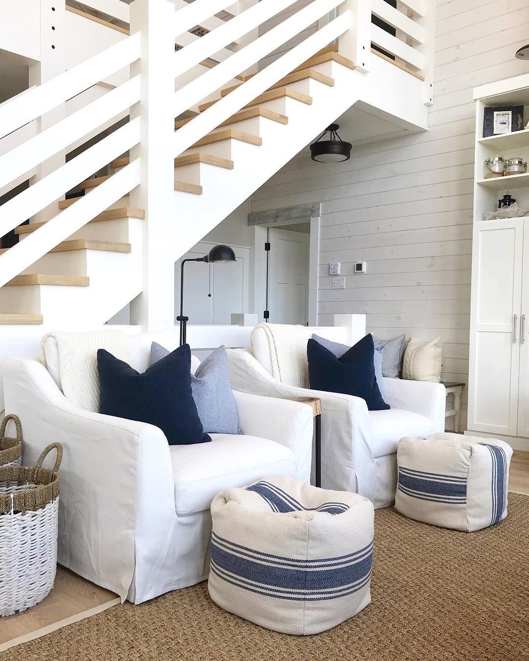 Coastal Living Room with Striped poofs @kerripopofprettyblog