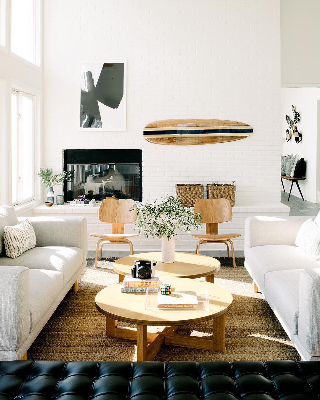 Coastal Living Room with Surfboard wall decor via @laurenpressey