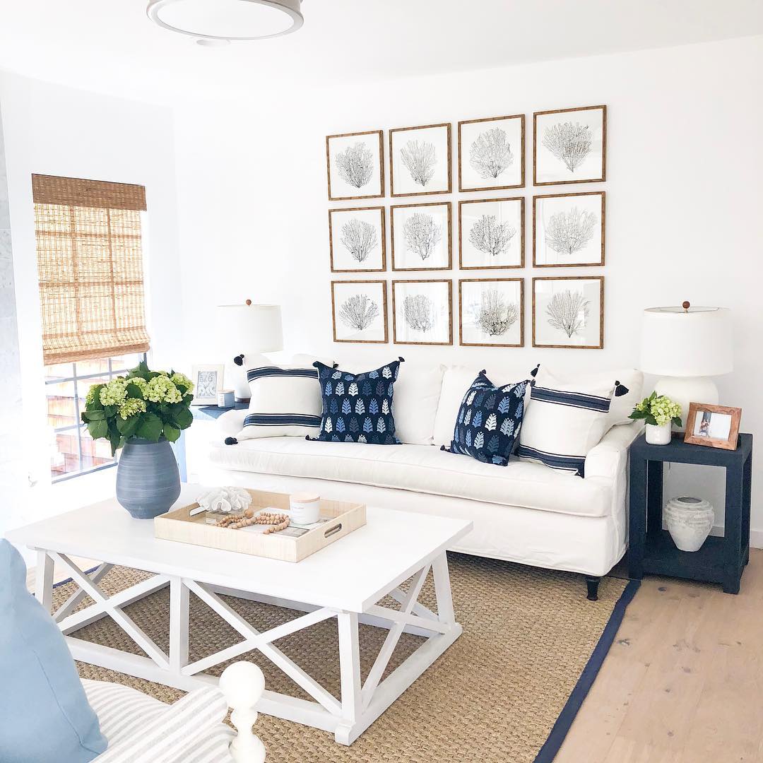 Coastal Living Room with White Sofa and Coffee Table via @agk_designstudio
