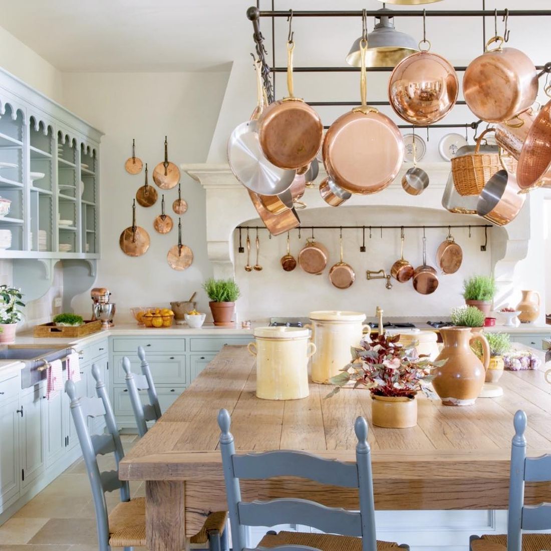 French Country Kitchen with Light blue Cabinets and Chairs via @provencepoiriers