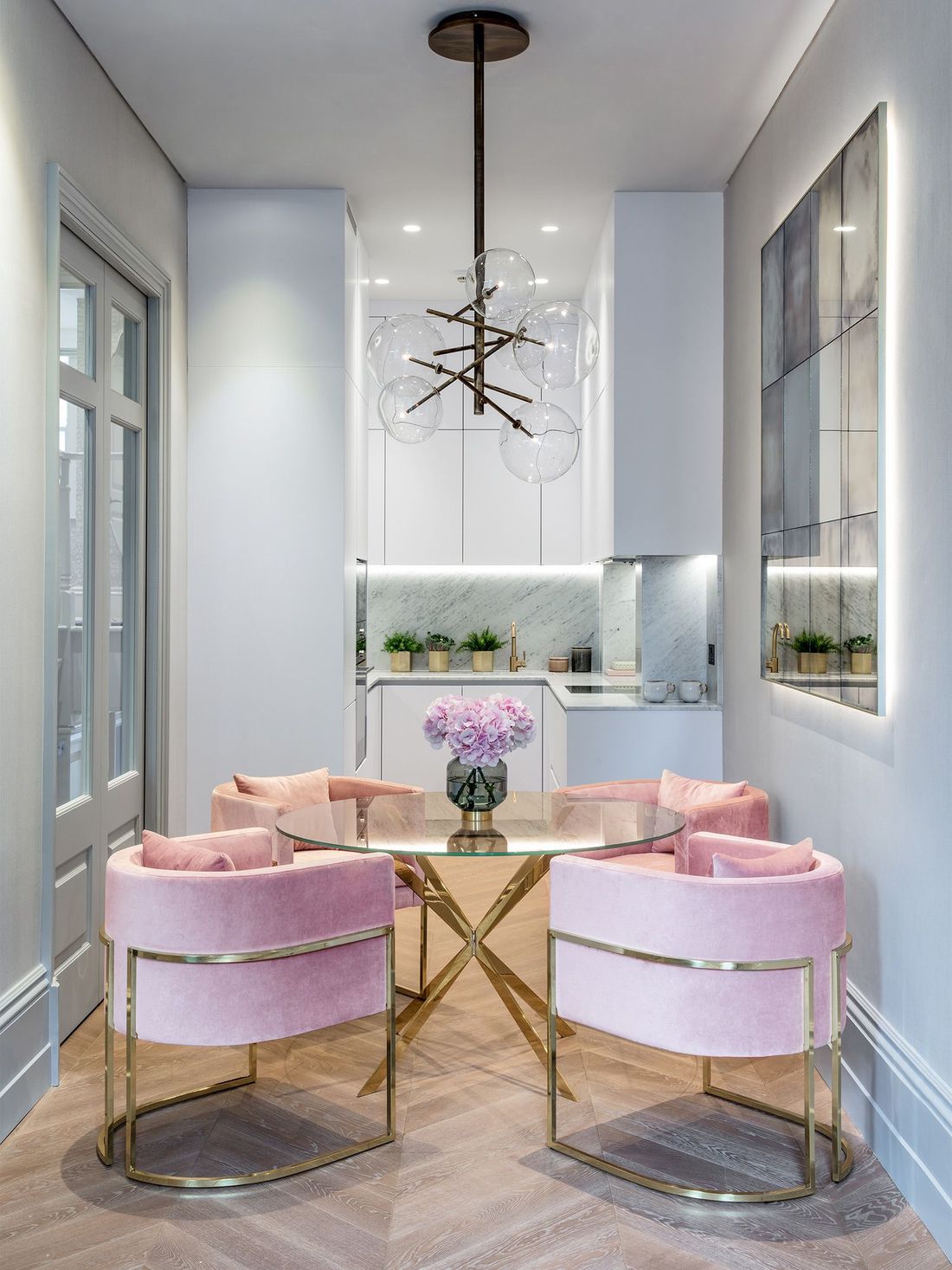 Glam Dining Room with Pink Velvet Dining Chairs via One Point Six