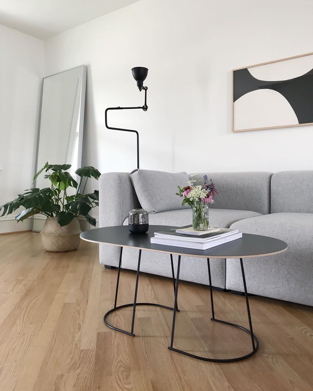 Minimalist Living Room with Abstract Wall Art via @minima_organizing