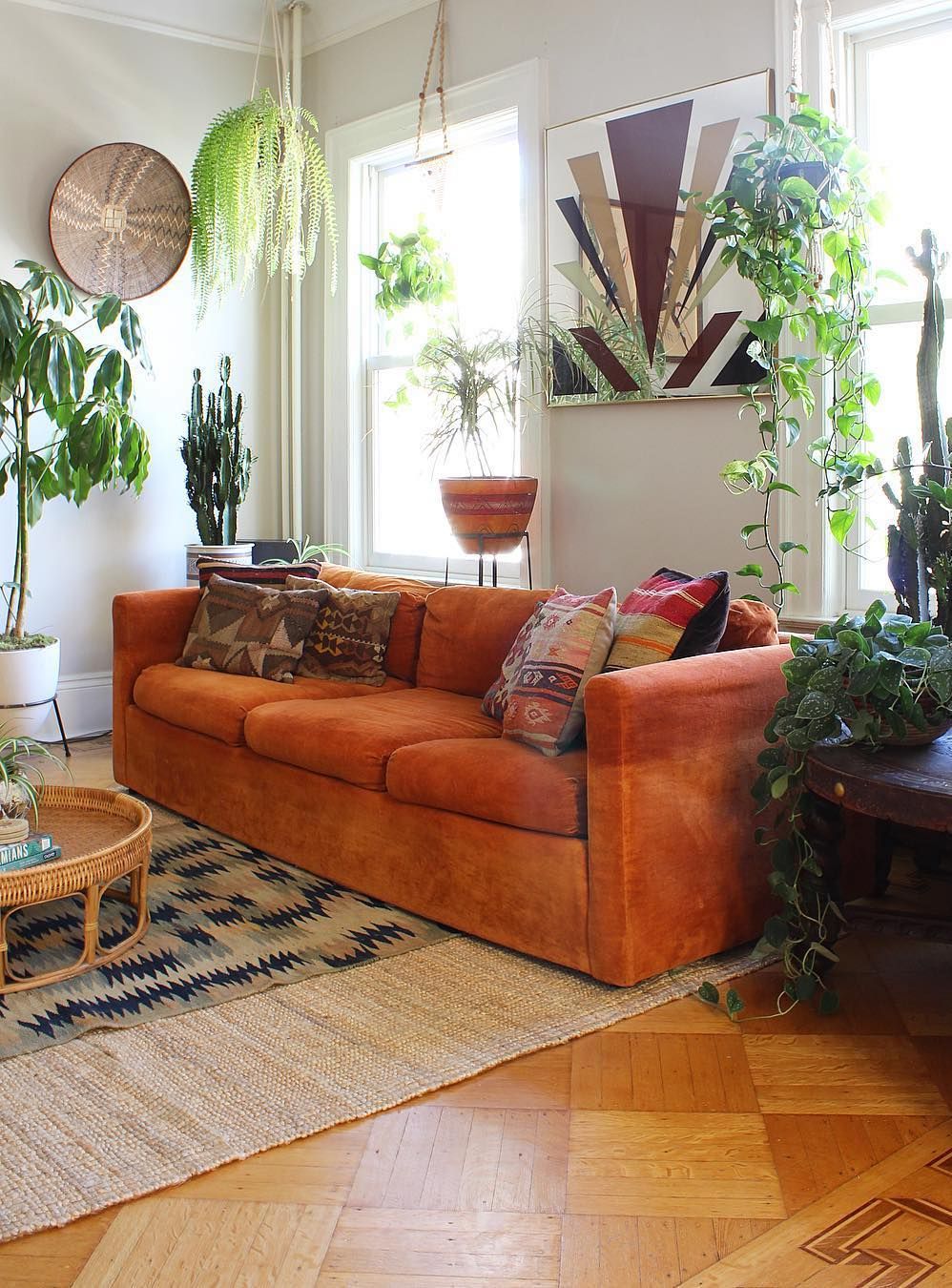 Orange Bohemian Sofa with Plants Living Room via @ball_and_claw_vintage.jpg