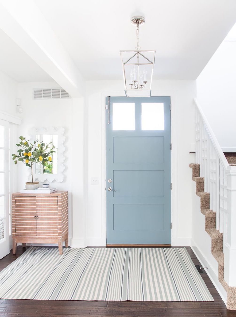 Coastal Entryway with Blue Front Door via @lifeonvirginiastreet