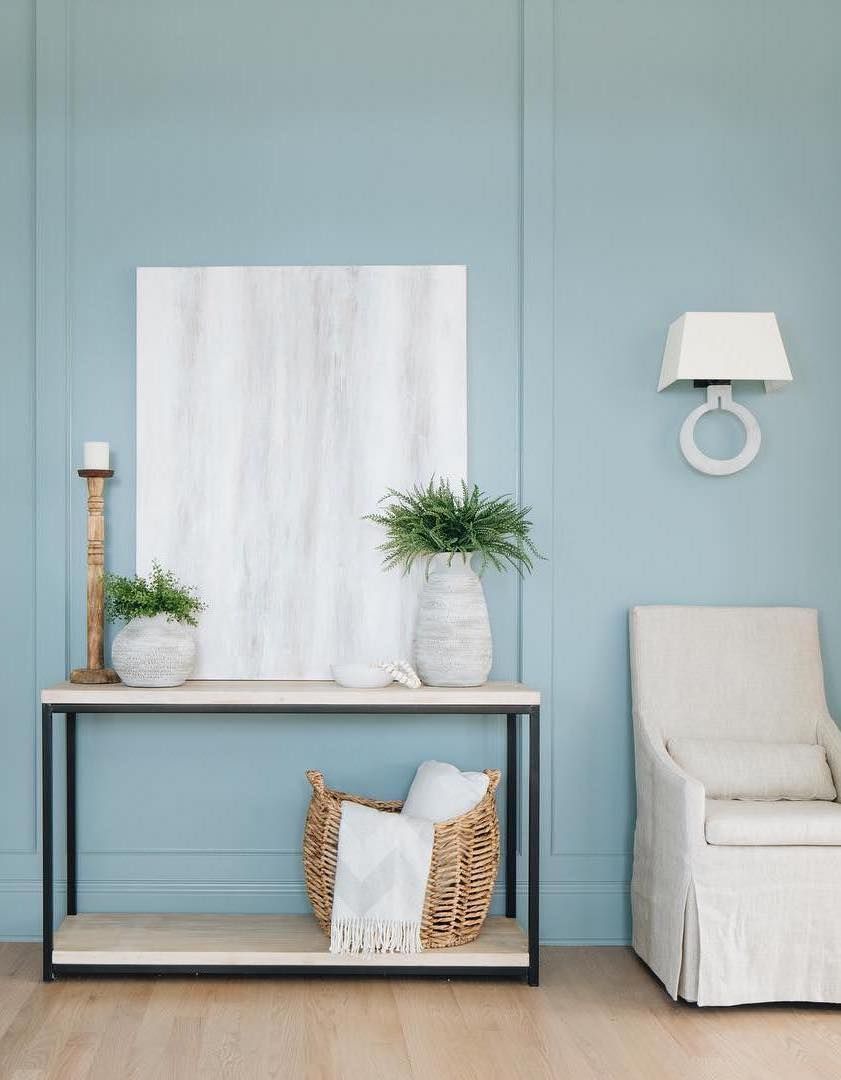 Coastal Entryway with Pastel blue wall paint via @timbertrailshomes