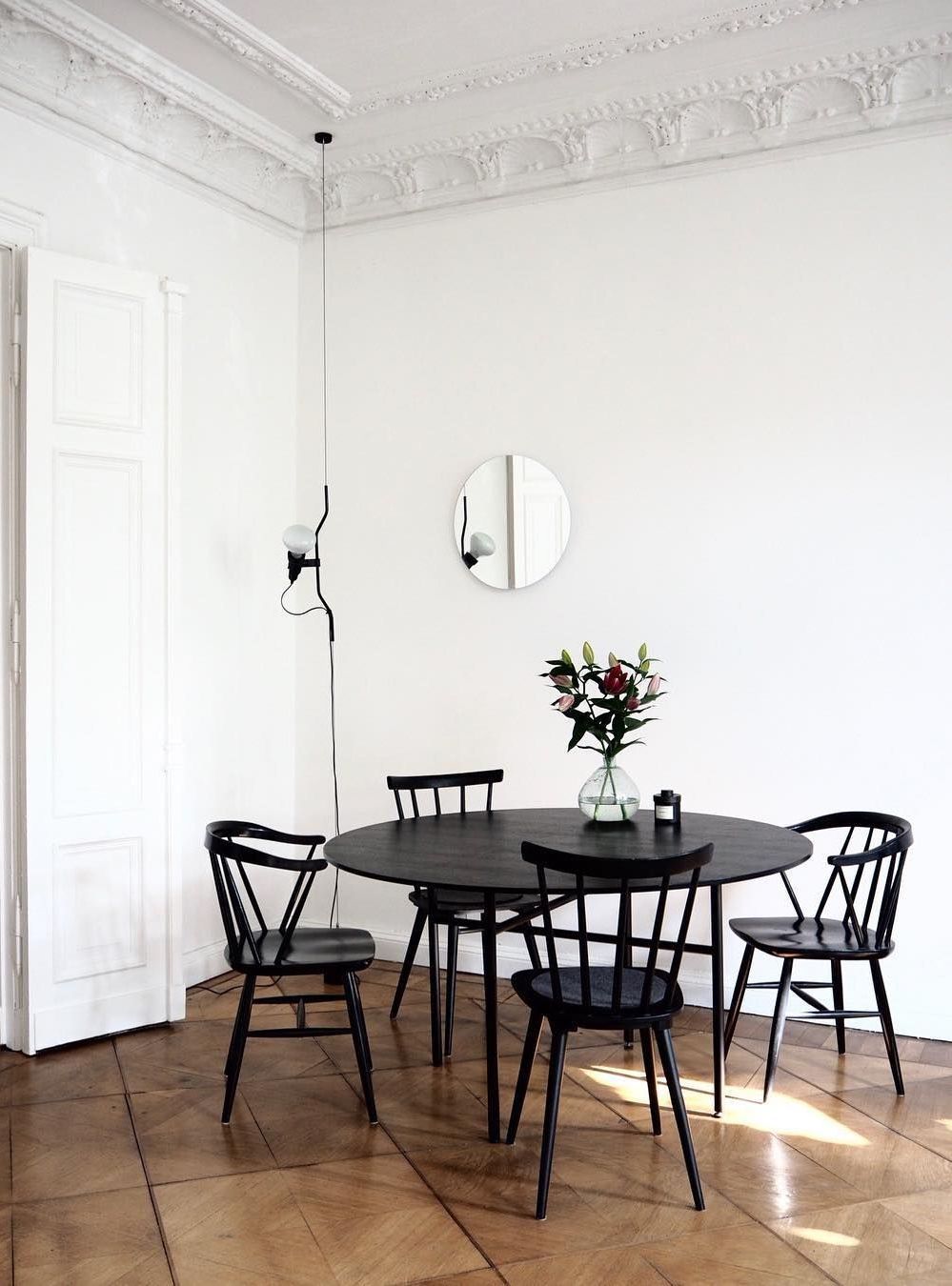 Scandinavian Dining Room with Black Dining Chairs via @selina.lauck