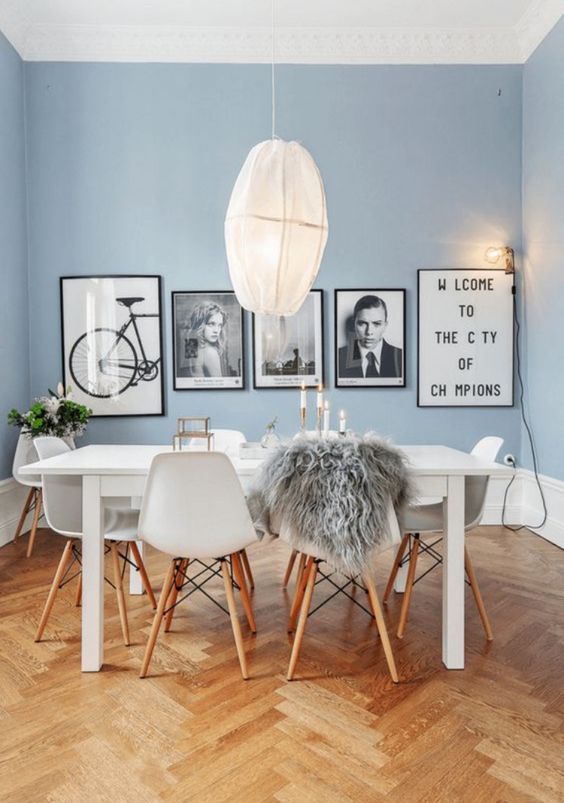 Scandinavian Dining Room with Blue Wall