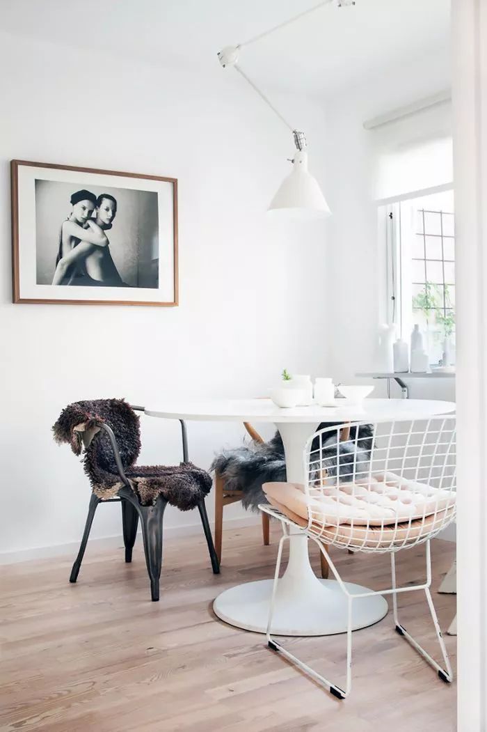 Scandinavian Dining Room with White Tulip Table via Pella Hedeby