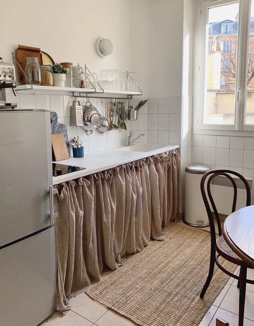 Simple Parisian Kitchen Design with Curtains below Counter via Instagram