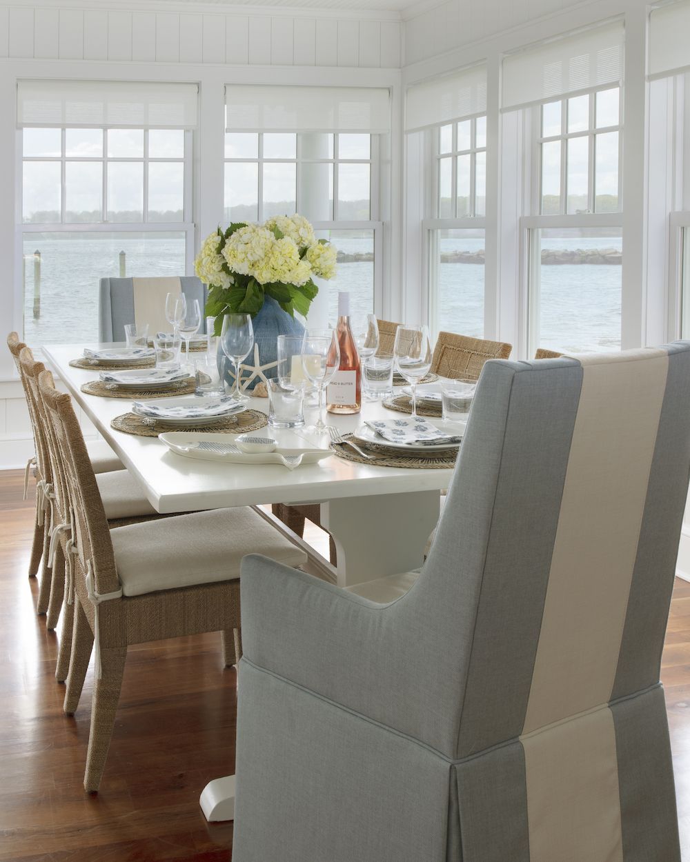 Coastal Dining Room with Blue Stripe Chair via Elements of Style