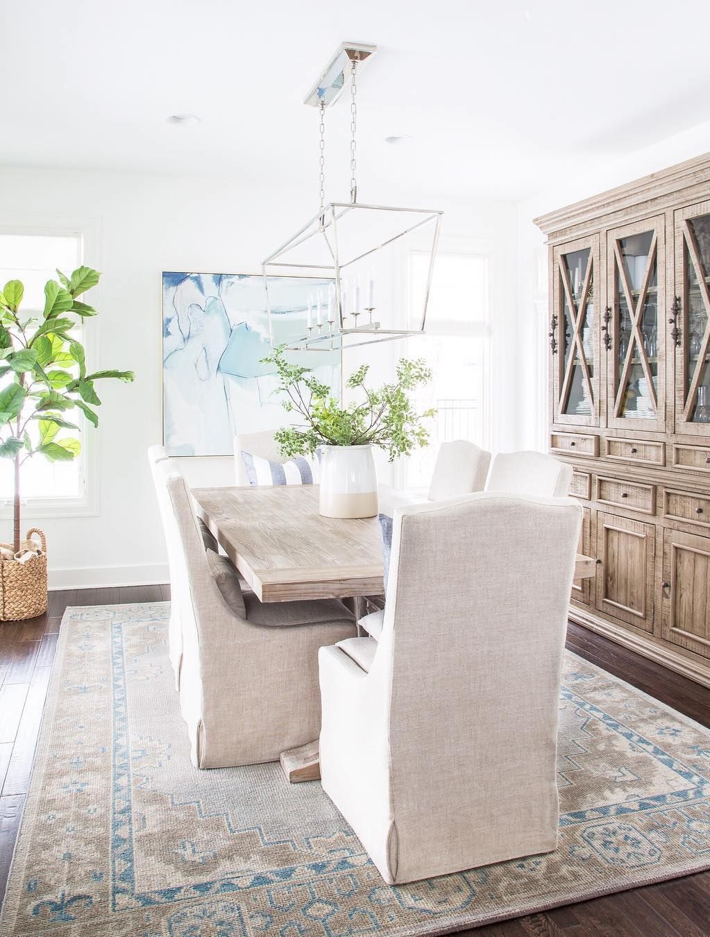 Coastal Dining Room with Linen Slipcovered Chairs via @lifeonvirginiastreet