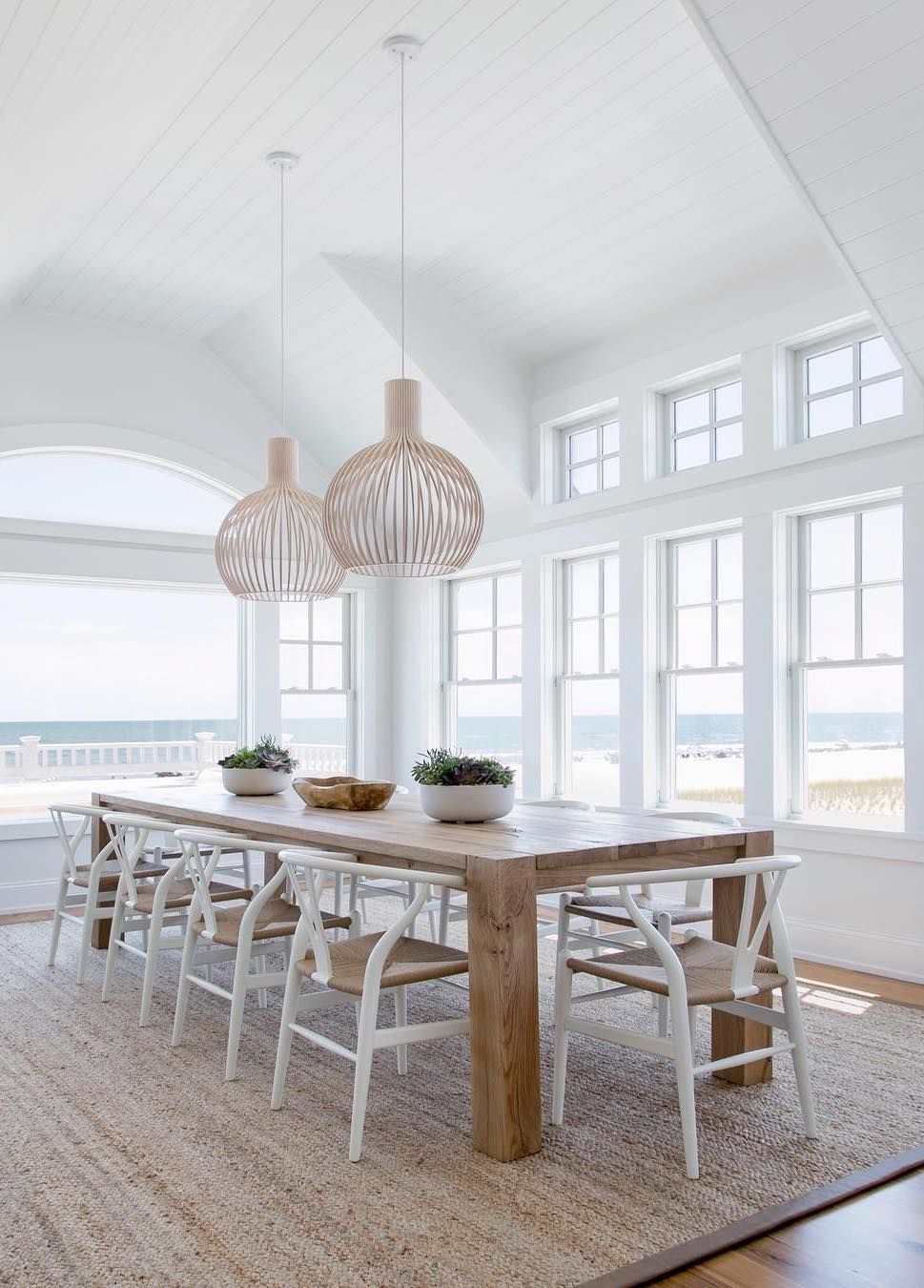 Coastal Dining room with White Wishbone Chairs via @changoandco