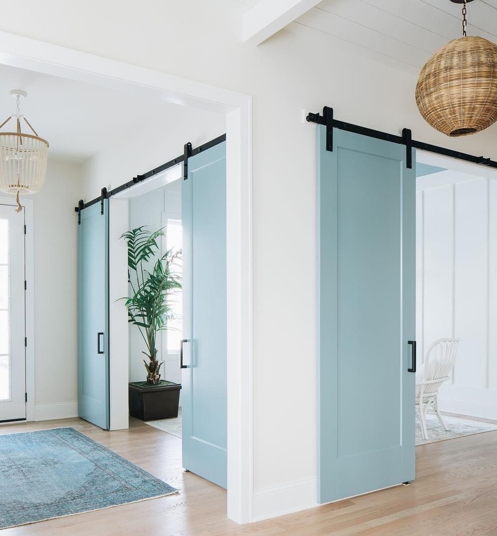 Coastal Office Decor Ideas - Blue Sliding Barn Doors via @timbertrailshomes