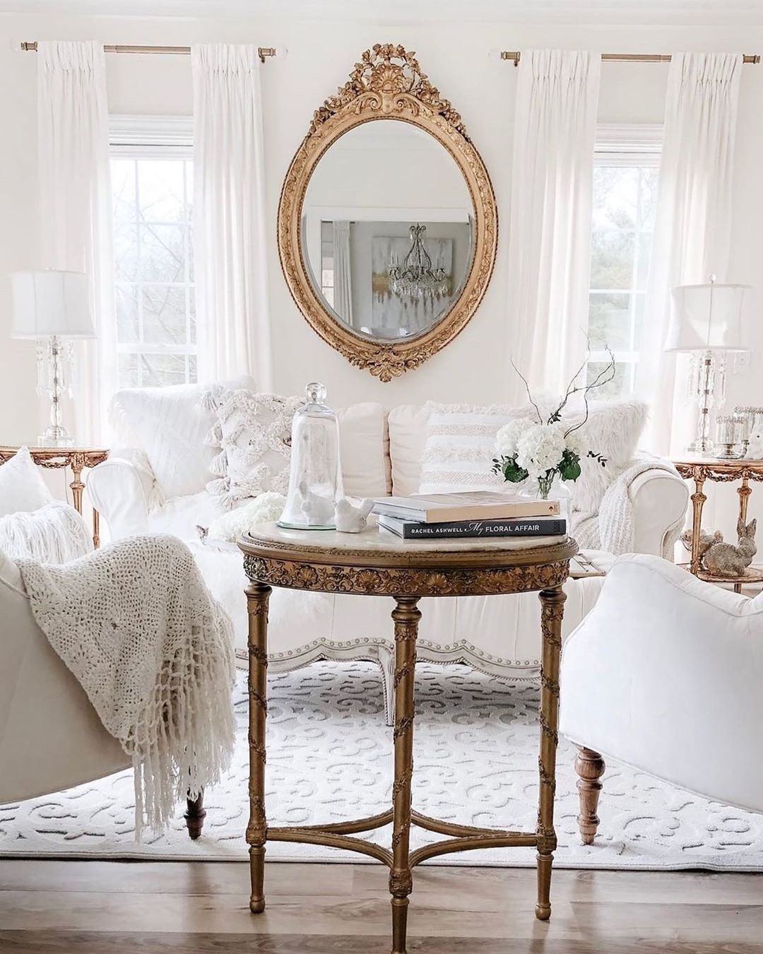 French Country Living Room with Gold oval Louis mirror via @ivorylanehome