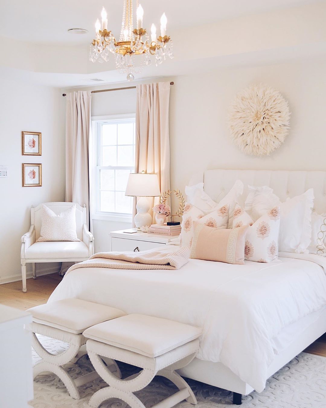 Glam Bedroom with Pale Pink decor accents and twin stools at food of bed via @the.pink.dream