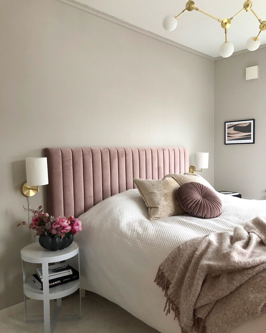 Glam bedroom decor with Dusty rose channeled headboard via @interiorbyvanessa