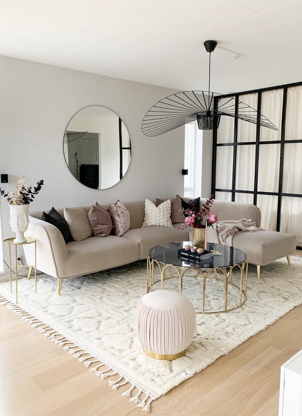 living room with sectional and chairs