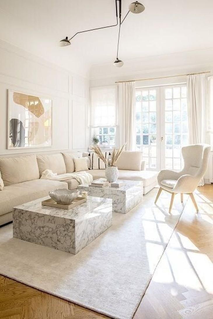 Neutral Rugs in Living Room with Beige Sofa and Marble Coffee Table